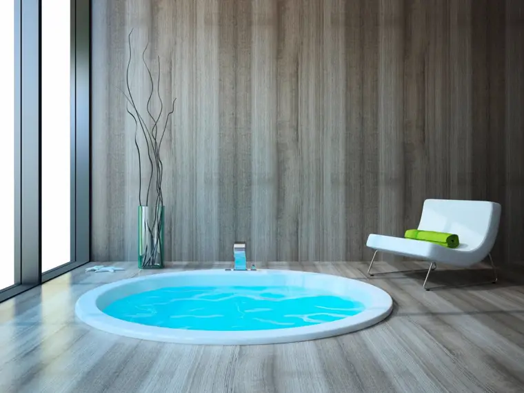 A sunken spa in a modern room